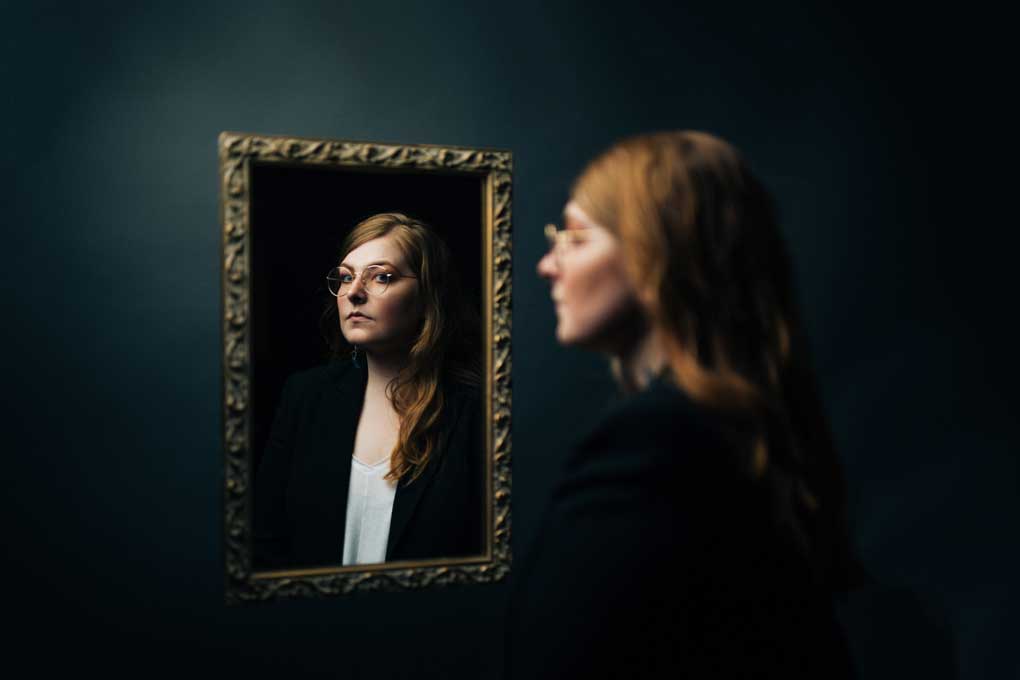 Picture of Sydney Slacas reflected in mirror