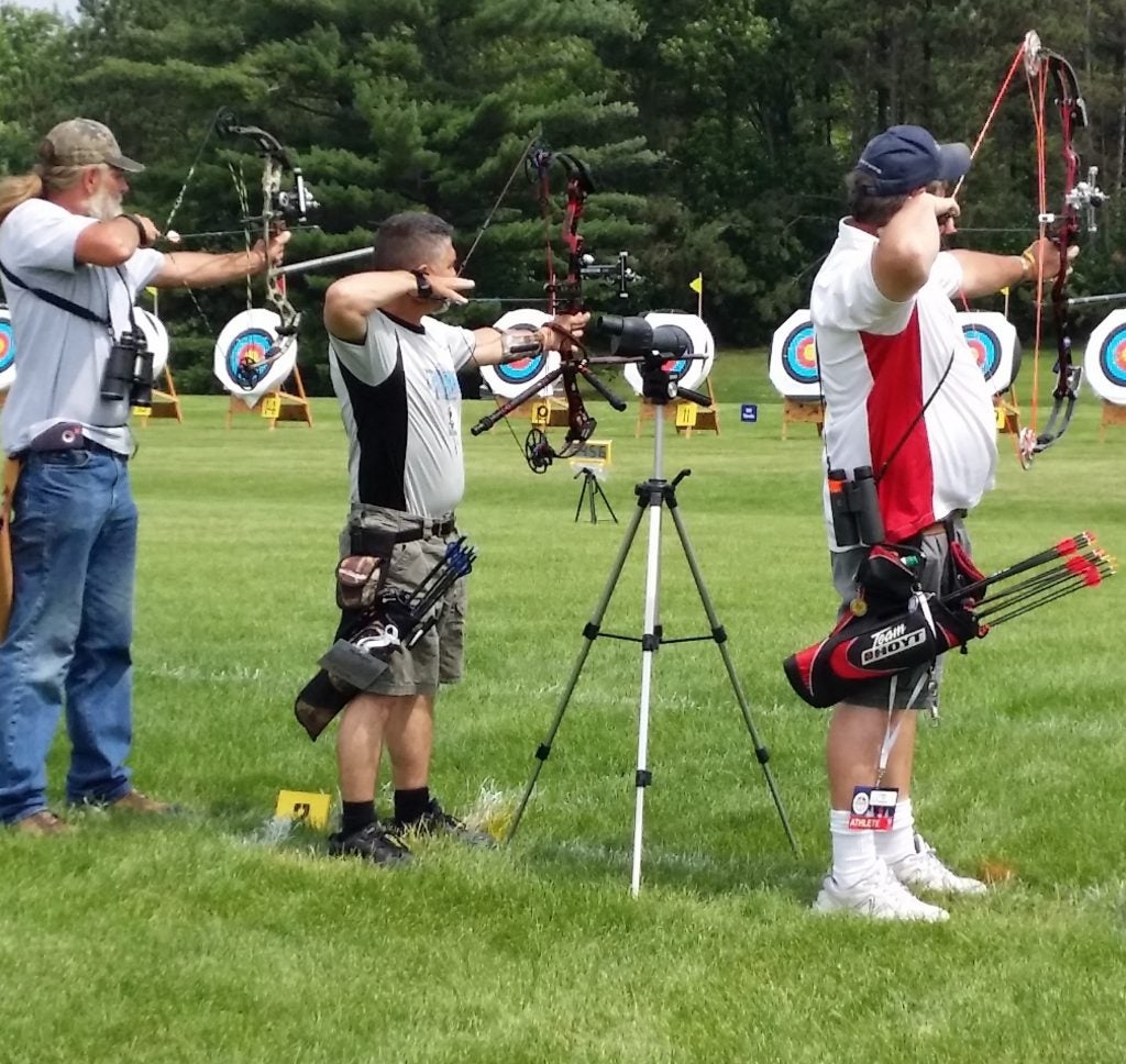Sam Arlia with bow drawn