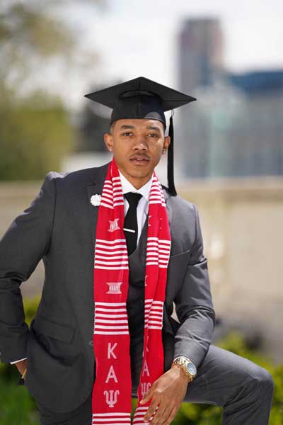 Case Western Reserve University student Tyrel Hill in graduation cap