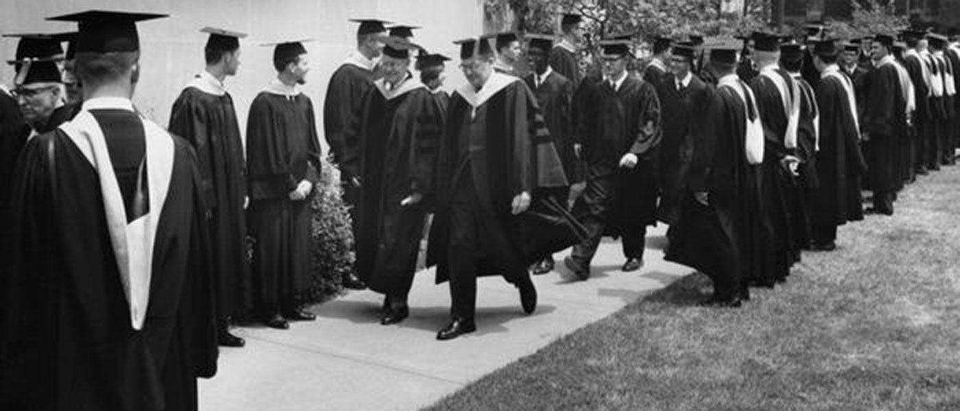 A group of graduates in caps and gowns during a Case commencement procession in 1967.