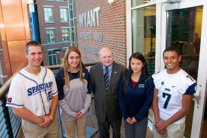 Jim Wyant with student athletes
