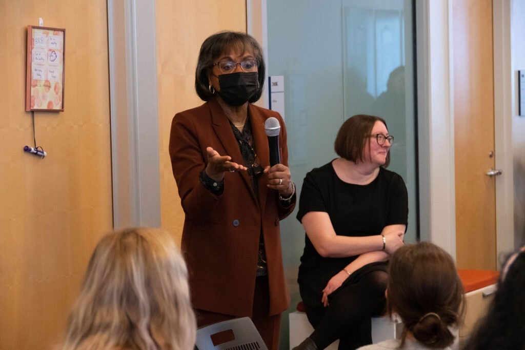Photo of Anita Hill talking with CWRU students on campus