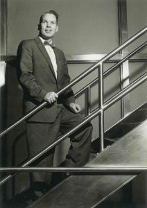 Arthur P. Leary stands in a stairwell in an undated black and white photo.