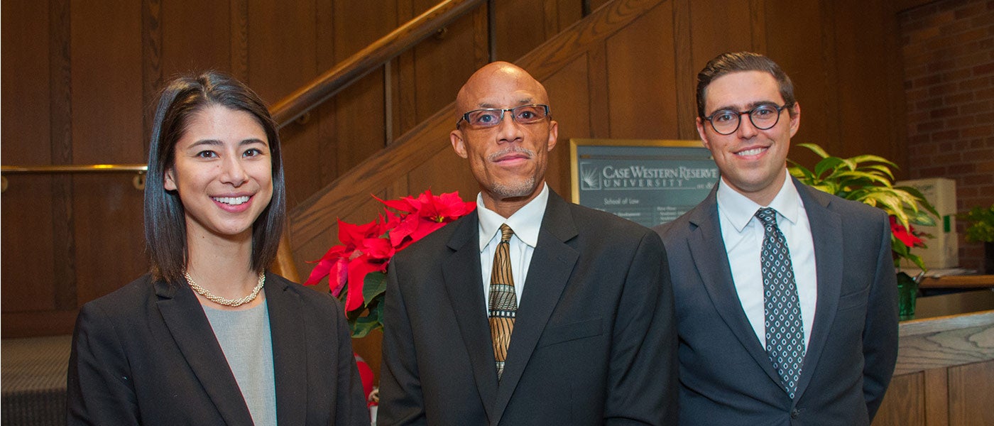 Mia Ulery , B-Buss Chairman Wendell Fields (center), and James Walsh