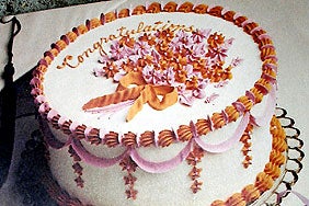 cake with "congratulations" written on it