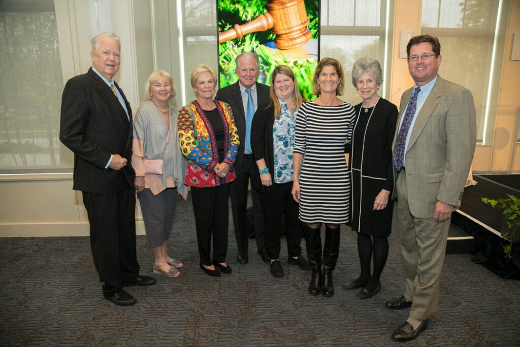 Coleman Burke with his family pose for a photo