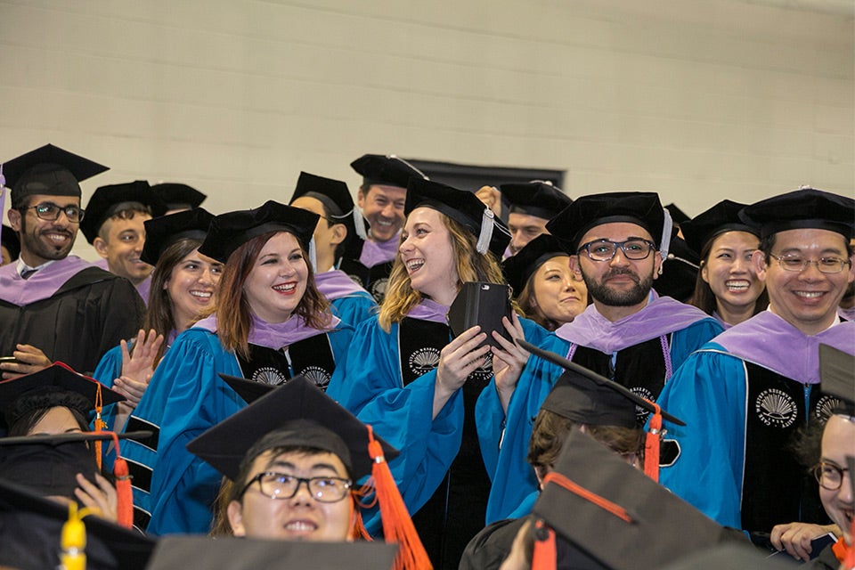 Photo of 2017 graduates smiling