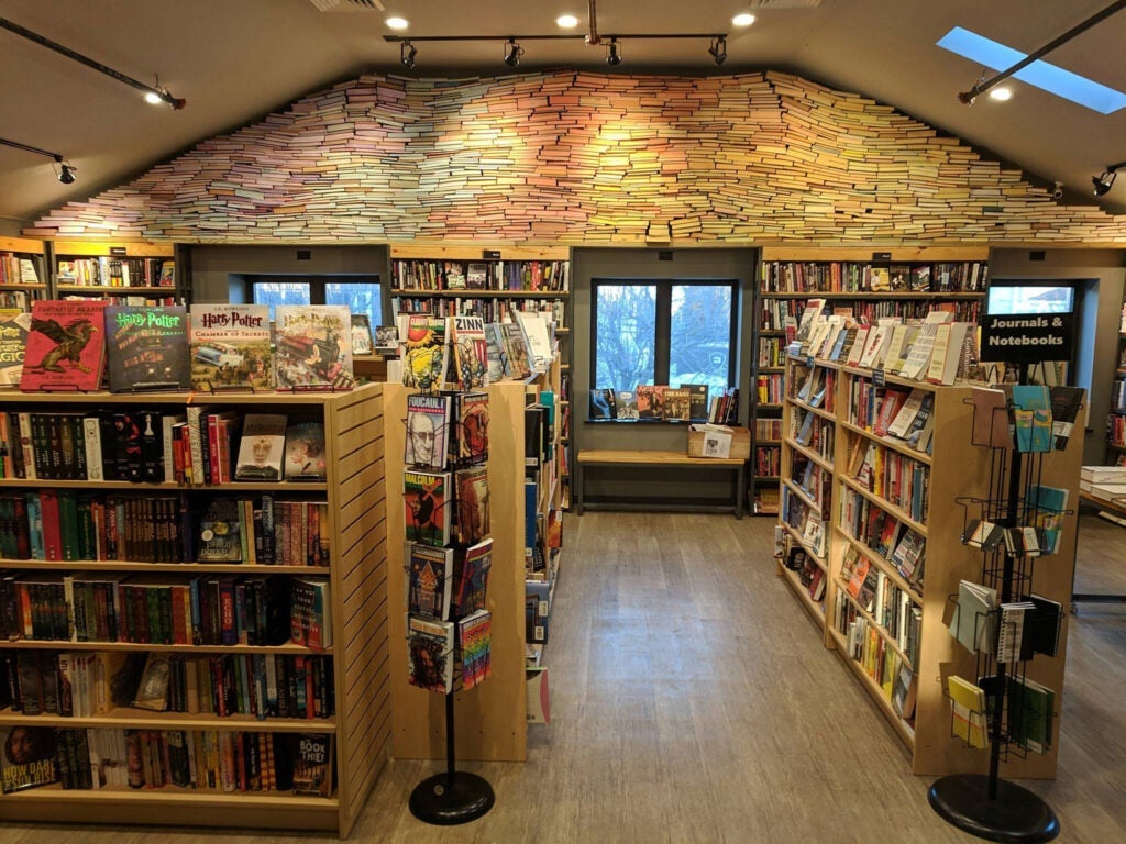 Photo of the interior bookshelves of Visible Voice Books