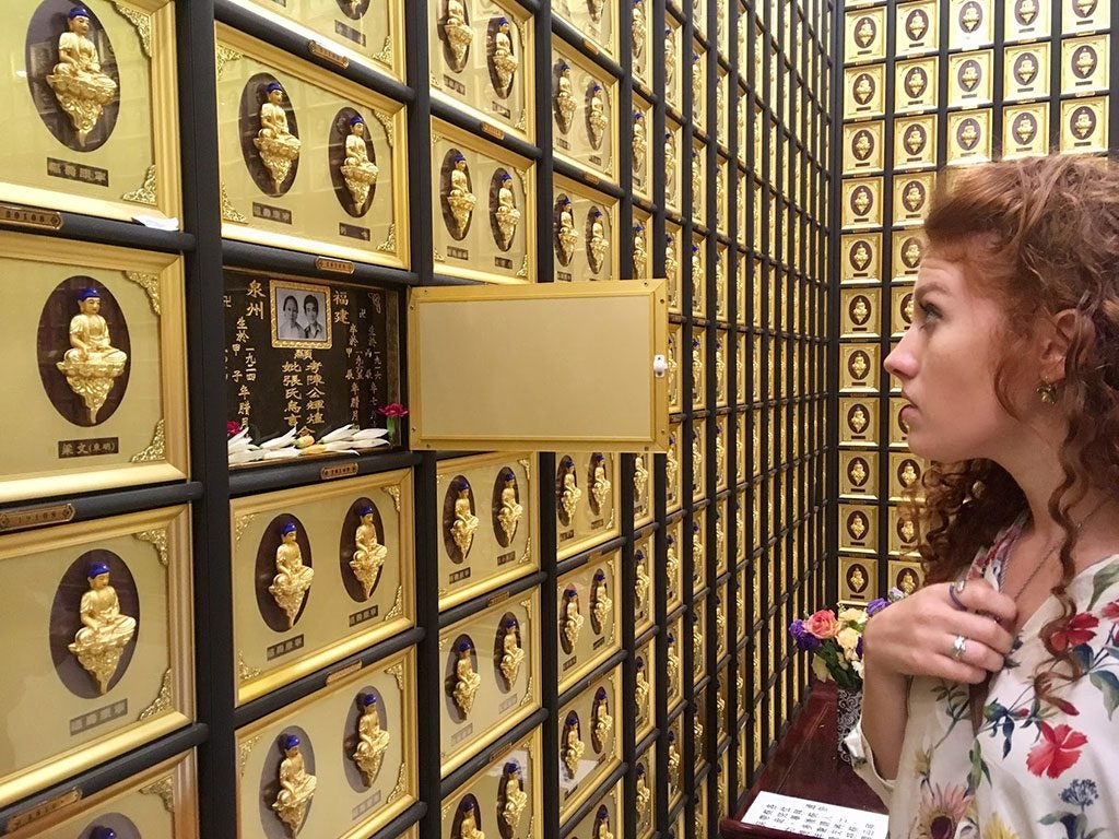 Student at the 10,000 Buddha's Temple in Hong Kong