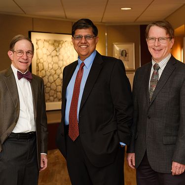 Picture of Sandy Markowitz, Amitabh Chak, and Joe Willis together, smiling