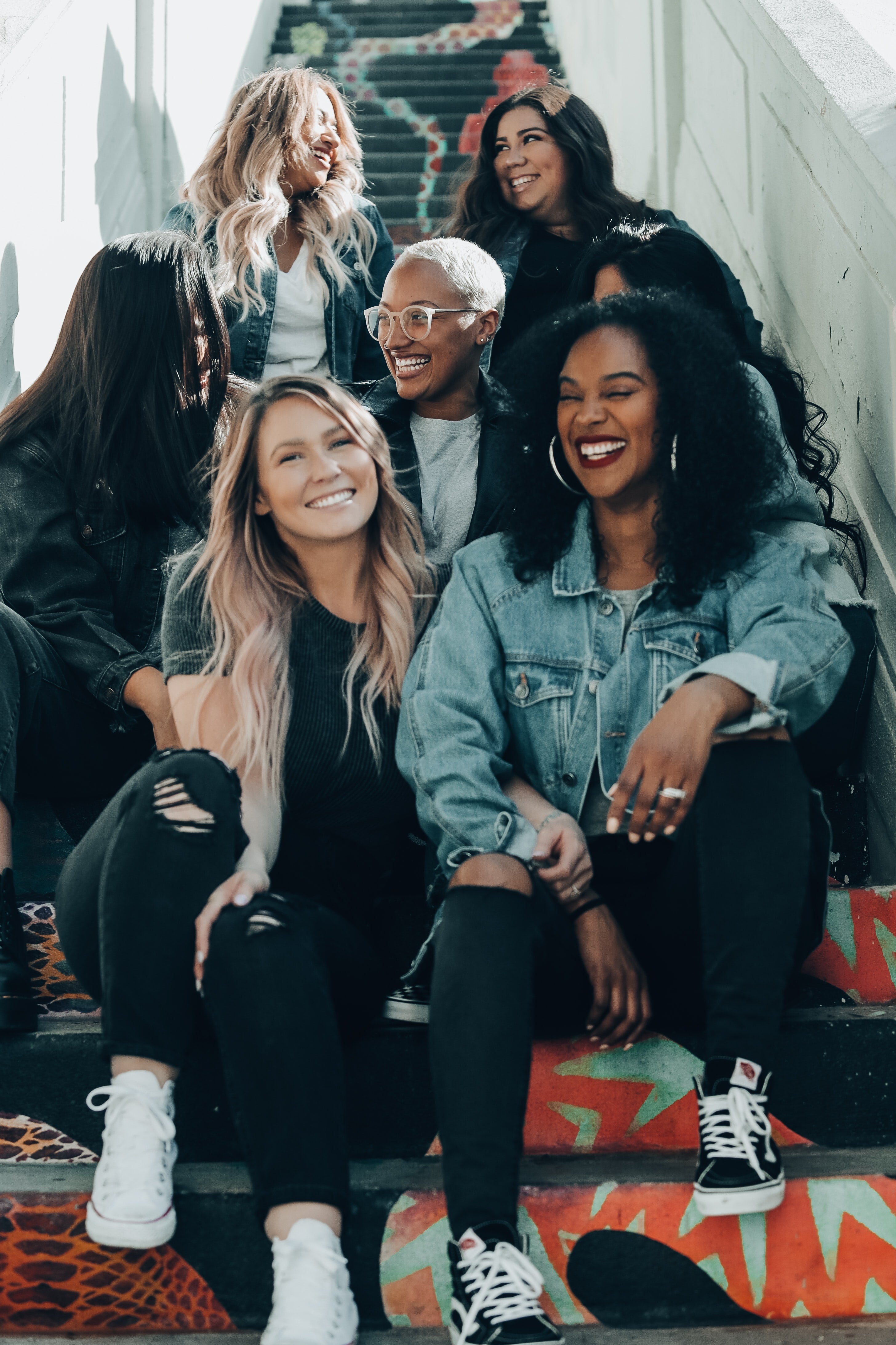 Group of people sitting on stairs