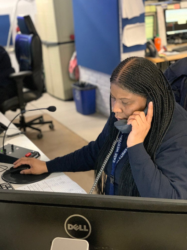 Photo of a CWRU dispatcher on the phone