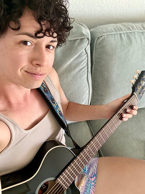 Trenley Anderson playing guitar