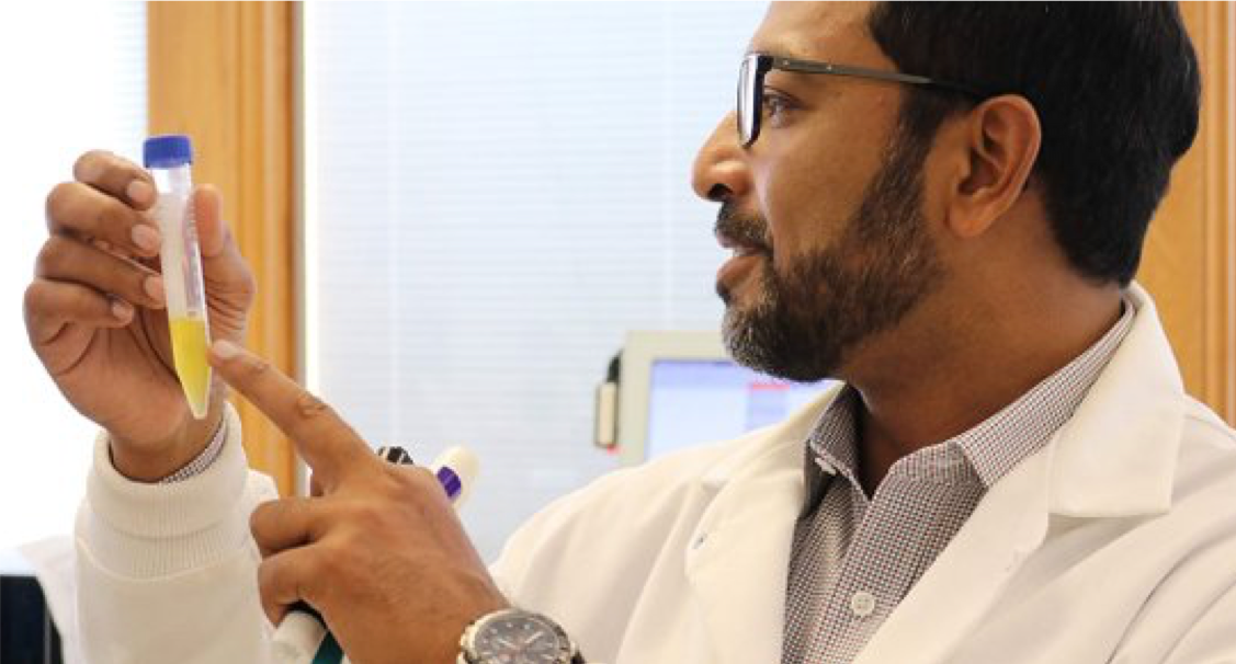 Anirban Sen Gupta holding synthetic platelets
