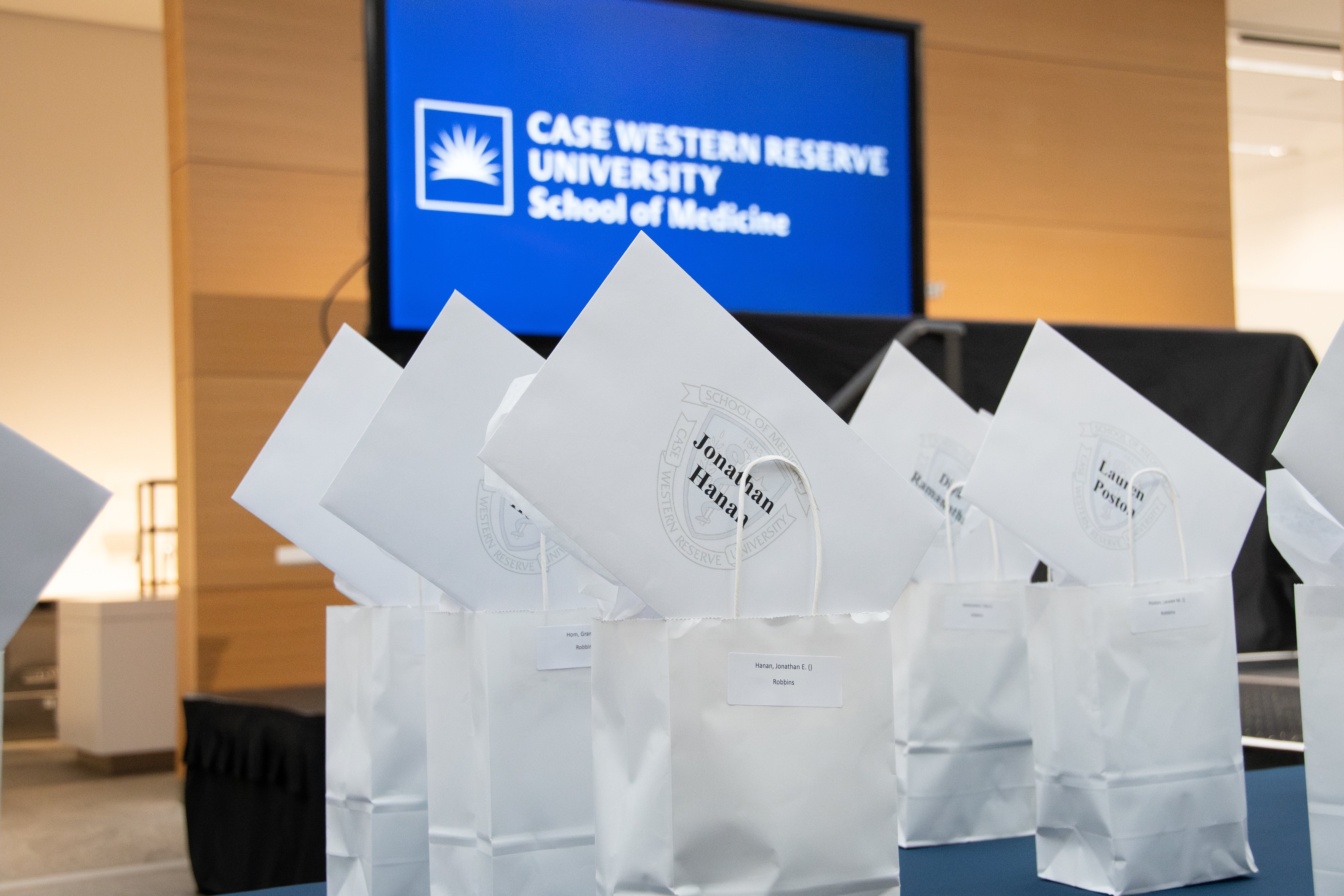 Table with bags full of envelopes