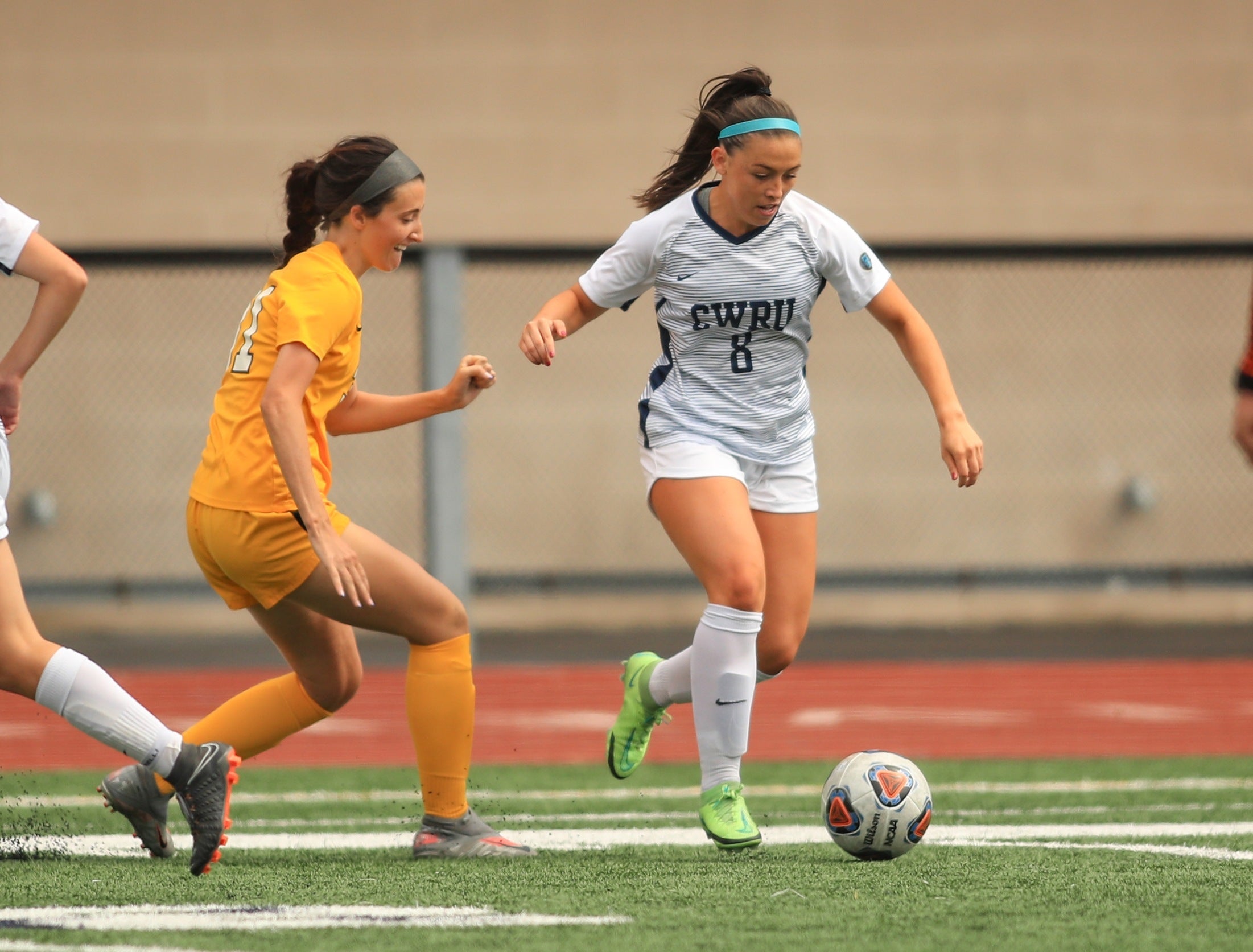 Laura Gorjanc kicks a soccerball during a game.