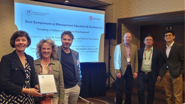 Ellen Van Oosten, Jodi Berg, Darren Good, Scott Taylor, Christopher Lyddy and Udayan Dhar.