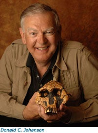 Donald Johansen holding study cast of "Lucy" skull