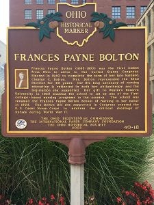A photo of one side of the Frances Payne Bolton Ohio Historical Marker plaque