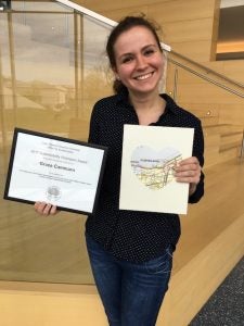 Photo of Grace Cammarn holding certificate