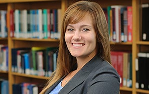 Headshot of Mandel School faculty Megan Holmes