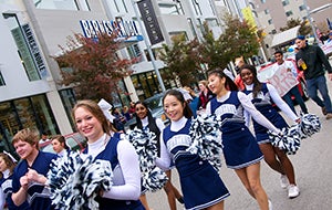 Cheerleaders participating in homecoming festivities
