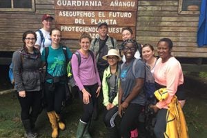 Mandel School students and Assistant Professor Mark Chupp pose for photo on study abroad trip to Ecuador