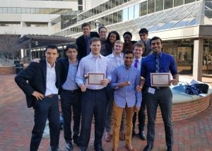 CWRU's model UN team holding certificates from competition