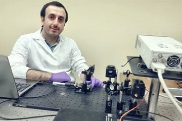 Mustafa Unal working in the lab