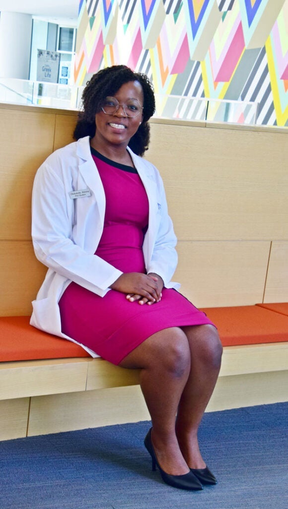 Photo of Olubukola Abiona in her white coat