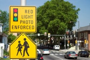 Red light camera sign
