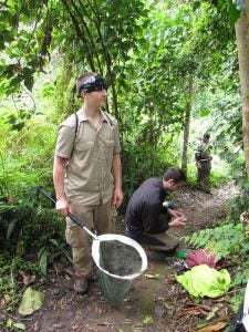 Riley Tedrow using net in Rwanda