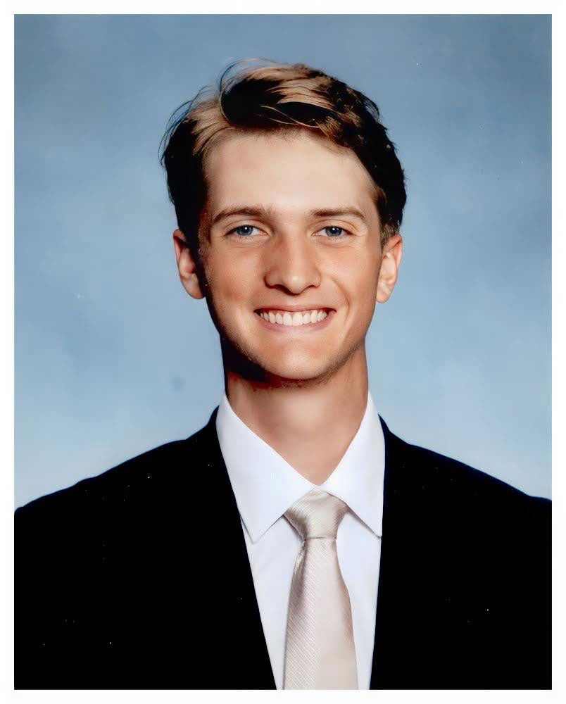 Photo of Robert Boyce wearing a suit
