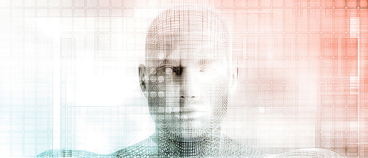 Photo of researcher with robot. 