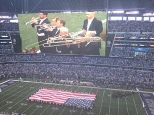 Ryan Anthony performs the National Anthem at NFL Thanksgiving Day game