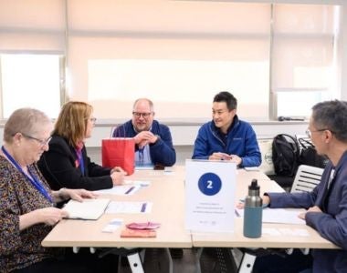 Sippel (third from left) discussing collaborations with representatives from two Taiwanese universities