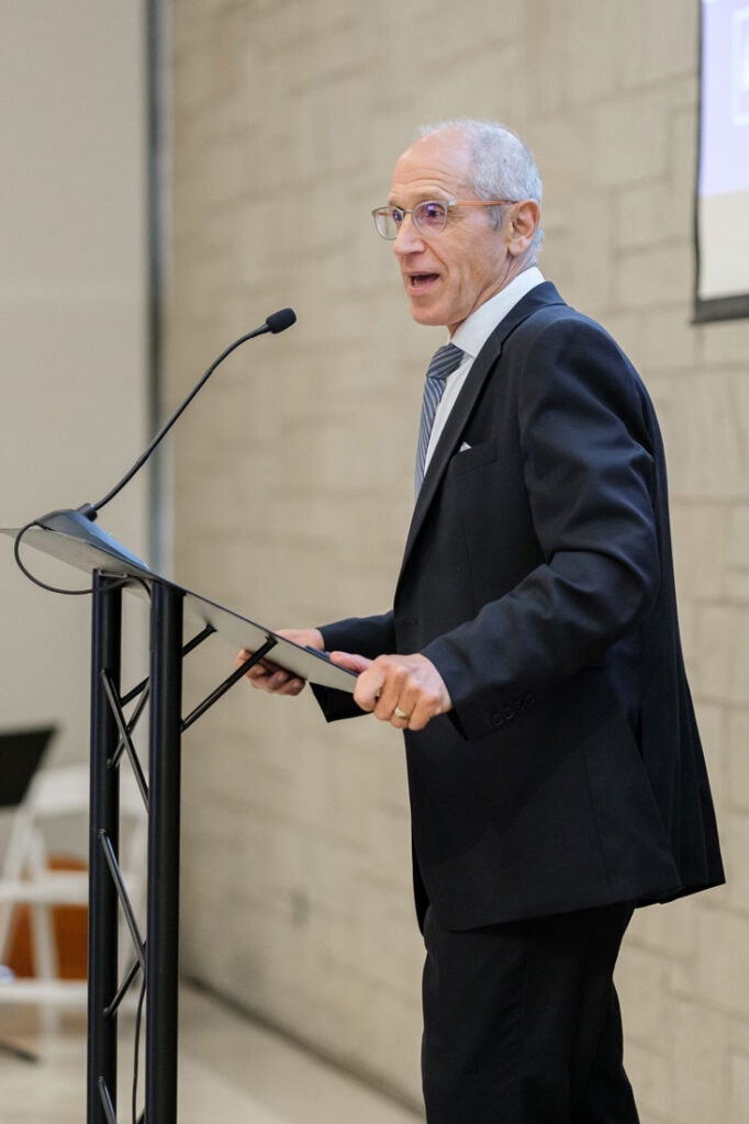 Photo of Stan Gerson speaking at a podium