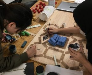 Students hand-painting DApp Tycoon at Sears Think[box]