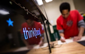 student working in Sears think[box]