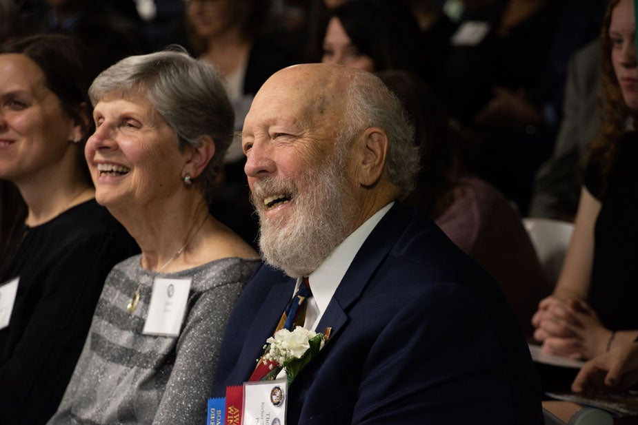 Photo of Janet and Tom Kicher in the audience of an event at homecoming 2018