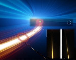 a photograph of a new type of laser beam, shown as red light on a blue background