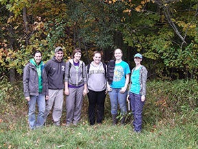 A group photo of professor Burns and her students