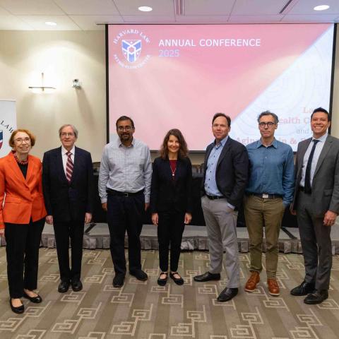 Sharona Hoffman (center) with assembled Harvard Law faculty members