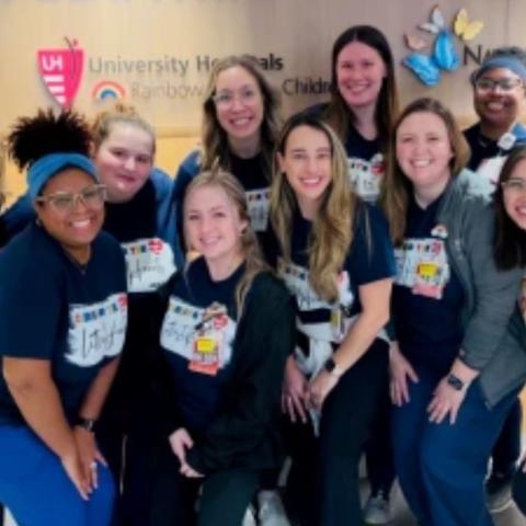Cristin Coleman and other founding members of UH Rainbow Babies &amp; Children’s Hospital&#039;s pediatric cardiac intensive care unit pose for a group photo.