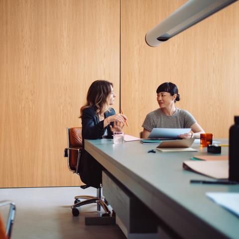 two female Entrepreneurs sitting at a table