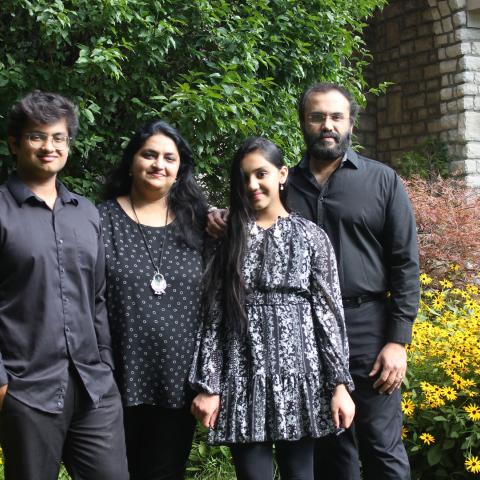 A family poses for a group photo