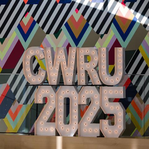 Photo of CWRU 2025 spelled out in marquee lights in Tinkham Veale University Center