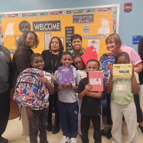 Staff members of Project STEP-UP partner with the CWRU Staff Advisory Council to donate supplies to students of Daniel E. Morgan School.