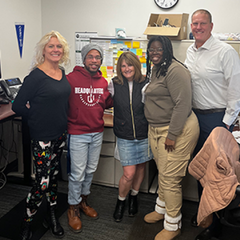 Bridget Flowers, Jermaine Brown, Diane Olshavsky, Kiara Lane and Dean Tufts pose for a group photo.