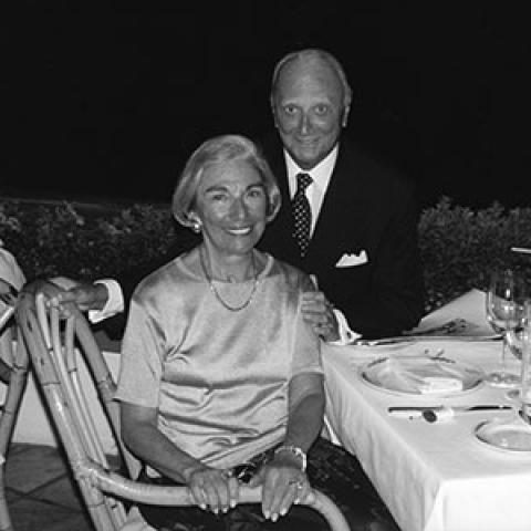 Milton and Roslyn Wolf pictured at dinner in a black and white photo